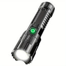 Una linterna super brillante, recargable por USB, con enfoque retráctil, haz ancho, linterna de iluminación de emergencia portátil, adecuada para exteriores, exploración y iluminación de trabajo.
