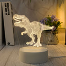 Luz Nocturna de Dinosaurio en 3D con Alimentación por USB - Lámpara Creativa de T-Rex con Efecto Luminoso, Decoración Moderna para Dormitorio y Mesa, Regalo Perfecto para Jóvenes y Adultos, Base Blanca, Material Plástico, Iluminación Ambiental con Alimen