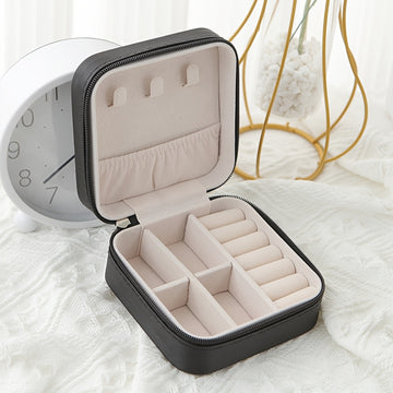 Estuche Elegante de Joyería Portátil en Piel Sintética para Mujeres - Organizador Compacto con Cierre de Cremallera, Compartimentos Múltiples para Anillos, Pendientes y Collares, Interior Forrado en Tela, Soporte para Aretes, Estilo Moderno, Construcción