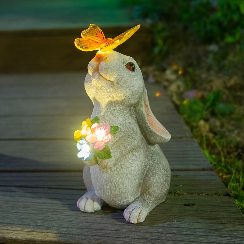 Una estatua de conejo decorativa para exteriores con luces de mariposa solares, perfecta para decoración de jardín, adecuada para patios, balcones y jardines - un regalo de bienvenida a casa único.