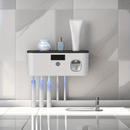 Portacepillos inteligente con luz UV, organizador de baño sin taladro, carga USB, 4 compartimentos coloridos, diseño blanco moderno para cepillos de dientes e hilo dental, instalación sin perforaciones, estética contemporánea