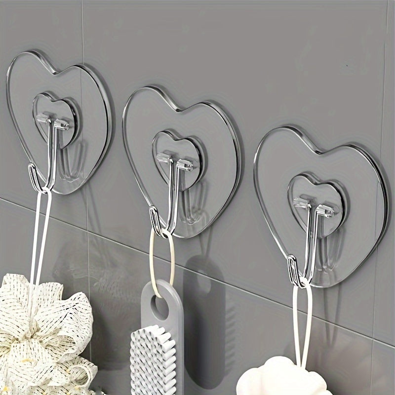 10 ganchos adhesivos grandes y resistentes, copas de succión transparentes sin taladro, soportes para pared en forma de corazón reforzados para almacenamiento en cocina y baño, fácil instalación, estilo casual, ganchos utilitarios