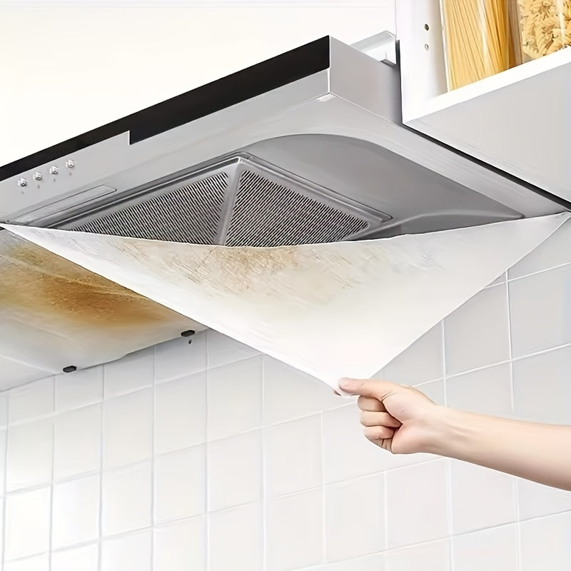 Juego de filtros de alta rendimiento para campanas de cocina, diseñados para absorber eficazmente la grasa y prevenir el humo, compatibles y duraderos con protección adhesiva.