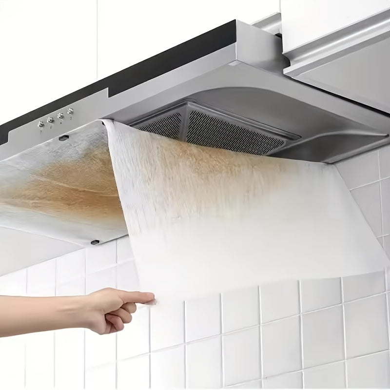 Juego de filtros de alta rendimiento para campanas de cocina, diseñados para absorber eficazmente la grasa y prevenir el humo, compatibles y duraderos con protección adhesiva.