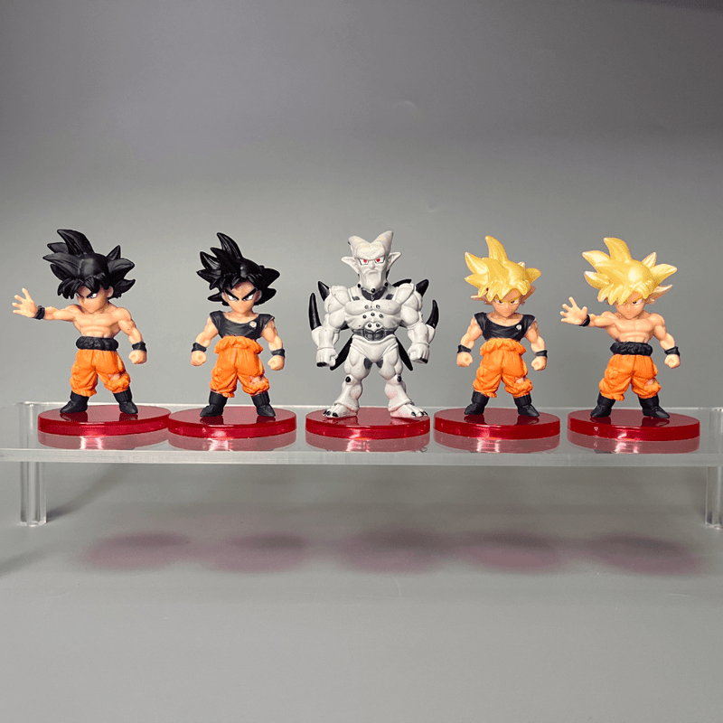 21 figuras de personajes populares del anime, incluyendo a los héroes Saiyan como Bulma, Vegeta y Piccolo, Frieza. Recibe 1 pieza al azar para decoración de escritorio
