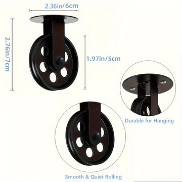 Un conjunto de 2 poleas negras de 2 pulgadas, 2 para luces de araña, diseñadas para poleas de pared vintage para luces de crecimiento de plantas en un gazebo industrial rústico.