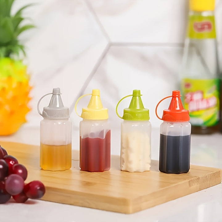 4 botellas mini portátiles para salsas - Duraderas, a prueba de fugas y fáciles de exprimir, ideales para loncheras, picnics y aventuras al aire libre