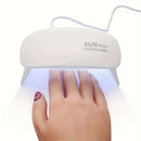 Lámpara de uñas portátil mini con 6 luces LED, color rosa y blanco, alimentación USB, diseño plegable, ideal para esmaltado en gel y secado, perfecta para cuidado de manos, pies y uñas