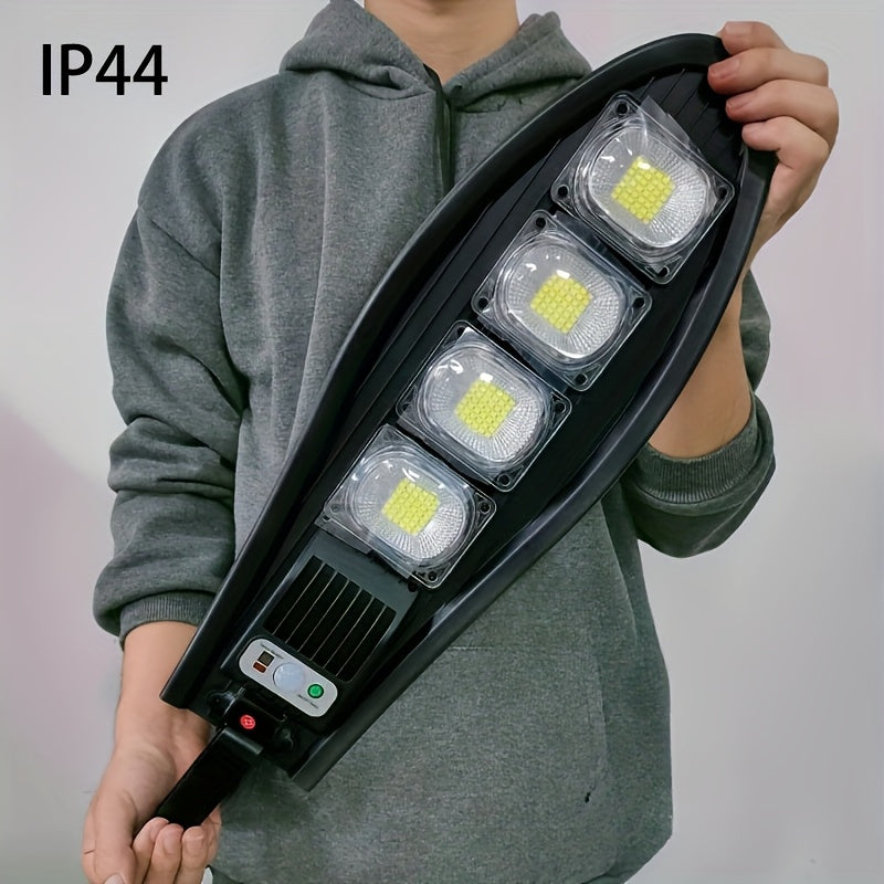 Lámpara solar LED para exteriores con sensor de movimiento ANKRIYUL, luz de seguridad COB para jardín, garaje, patio y área trasera, incluye control remoto
