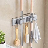 Organizador de pared para escobas y trapeadores, 1 estante metálico con ganchos ajustables, ahorrador de espacio, ideal para baño, cocina, jardín, lavandería o garaje - Acabado lacado, soporte para herramientas y estantes