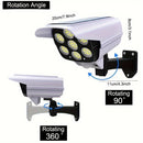 1 pieza de luz de calle solar KEWEN con sensor de movimiento, luz LED para patio con cámara simulada, alimentada por energía solar, voltaje de funcionamiento ≤36V, para entrada, pasillo, jardín, luz de pared de inducción de cuerpo humano, luz inteligente
