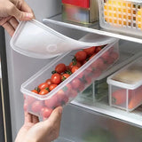 Juego de cuatro contenedores largos para almacenamiento de alimentos, ideales para mantener cebollas verdes, cilantro, jengibre, ajo, fideos y huevos organizados en el refrigerador, perfectos para esenciales de la cocina.