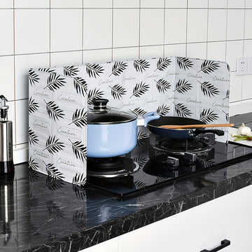 1 Protector de salpicaduras de cocina resistente al calor - 33,27" x 12,80" Cubierta de papel aluminio negro, adecuada para hornos de gas, protege paredes y superficies de daños por grasa y manchas.