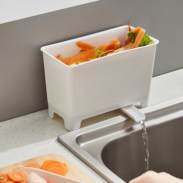 Un contenedor de basura de cocina no recargable con filtro - un recolector de basura de alimentos fácil de limpiar, adecuado para fregaderos, diseñado para ahorrar espacio en el hogar.