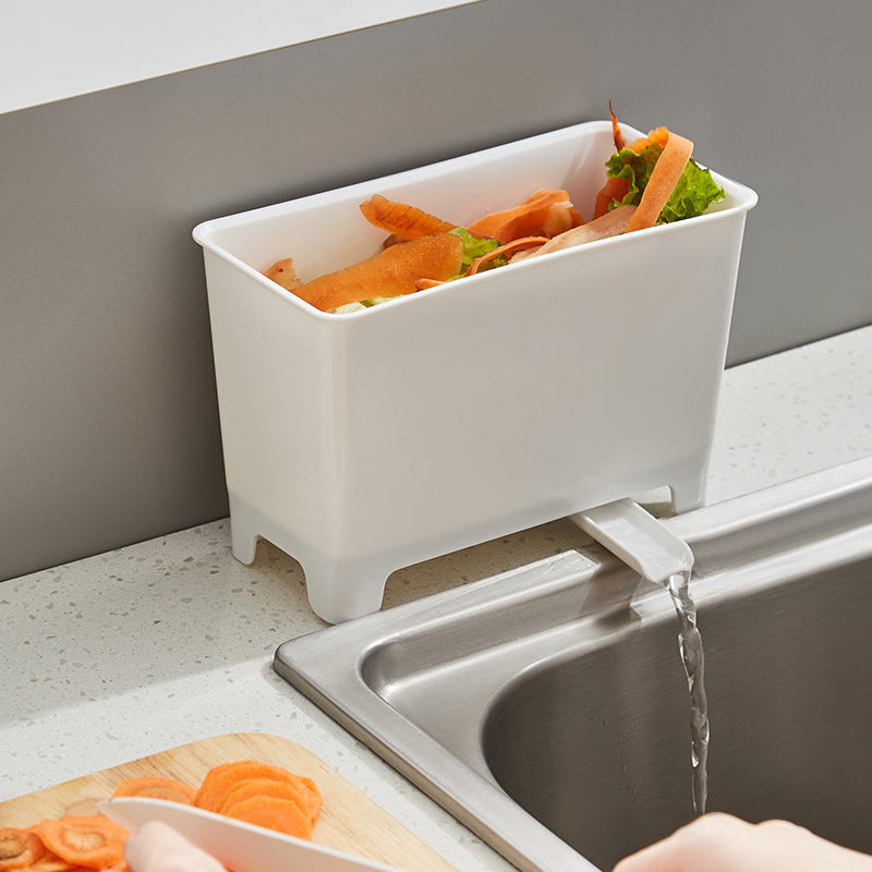 Un contenedor de basura de cocina no recargable con filtro - un recolector de basura de alimentos fácil de limpiar, adecuado para fregaderos, diseñado para ahorrar espacio en el hogar.