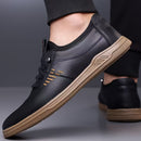 Zapatos casuales para hombre, ligeros y con suela suave, zapatos de conducción, zapatos de moda versátiles con patrón aleatorio, diseño de corte bajo, suela de TPR, forro de tela y parte superior.
