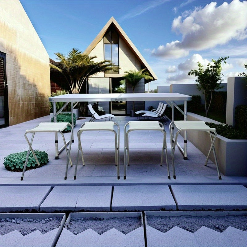 Este es un conjunto de mesas plegables elegantes y resistentes con sillas, que cuenta con una superficie fácil de limpiar. Su diseño de plegado rápido lo hace perfecto para pícnic íntimos, retiros en la orilla del lago y comidas en la playa.