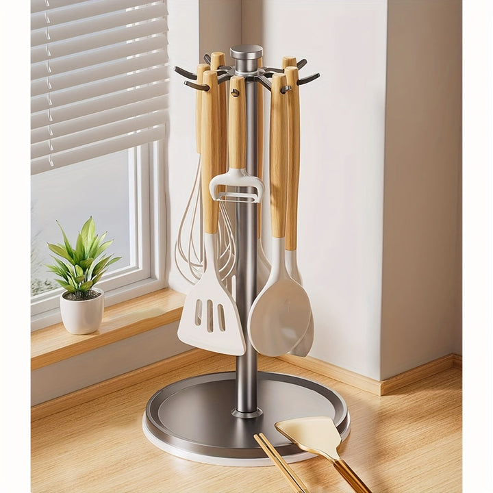 Un estante de almacenamiento de cocina sin necesidad de taladrar, con un gancho y barra giratorios para organizar utensilios como espátulas y cucharas, perfecto para escurrir.