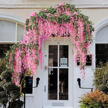 4 paquetes de 72 pulgadas (182,88 cm) de flores colgantes artificiales blancas de wisteria - Guirnalda de vino para arco de boda, fiesta, jardín, decoración del hogar - Perfecto para el Día de San Patricio, Pascua, primavera y verano, decoración al aire