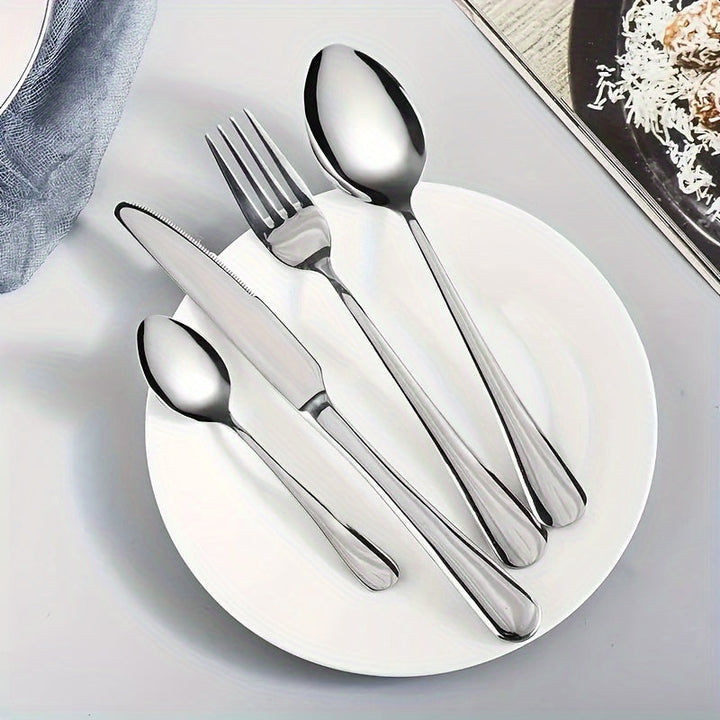 Un juego de vajilla de acero inoxidable de 16 piezas - vajilla elegante que incluye cuchillo de cena, tenedor, cuchara, cucharilla - cubertería moderna pulida a espejo para Navidad, Halloween, Pascua, Hanukkah, Acción de Gracias - apto para lavavajillas
