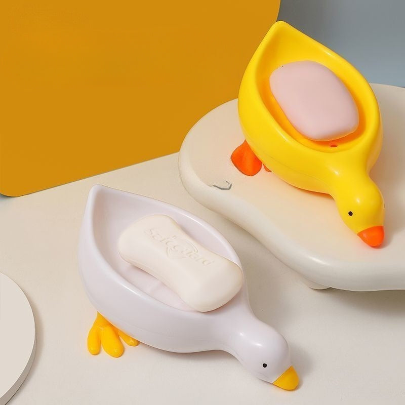 1pc Jabonera con Forma de Pato y Bandeja Ovalada Autodrenante - Accesorio para Baño Blanco y Amarillo, Plástico Duradero para Secado Rápido del Jabón y Soporte para Barras, Organizador Decorativo de Baño, Diseño Divertido | Diseño Efectivo de Drenaje