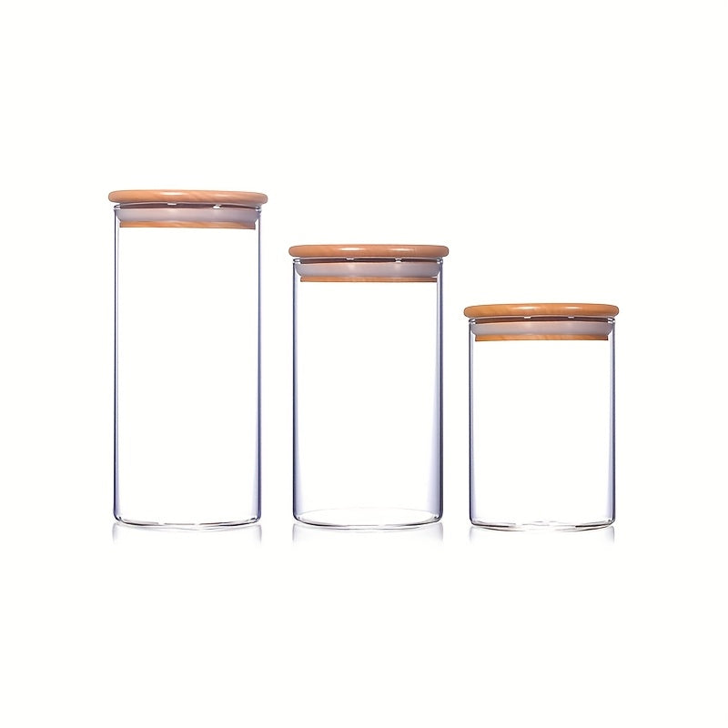 Un conjunto de doce frascos redondos transparentes con tapas de bambú, fabricados con vidrio de borosilicato de alta calidad, adecuados para almacenar granos, frijoles de café y hojas de té, con capacidades de 210 ml, 280 ml y 340 ml.