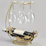 Soporte de vino de metal al estilo europeo vintage y portavasos – Diseño de hábitat verde elegante, perfecto para armarios de vino, restaurantes, bares y decoración de fiestas. Sostiene 1 botella de vino y 4 vasos – Ideal regalo de vacaciones