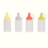 4 botellas mini portátiles para salsas - Duraderas, a prueba de fugas y fáciles de exprimir, ideales para loncheras, picnics y aventuras al aire libre