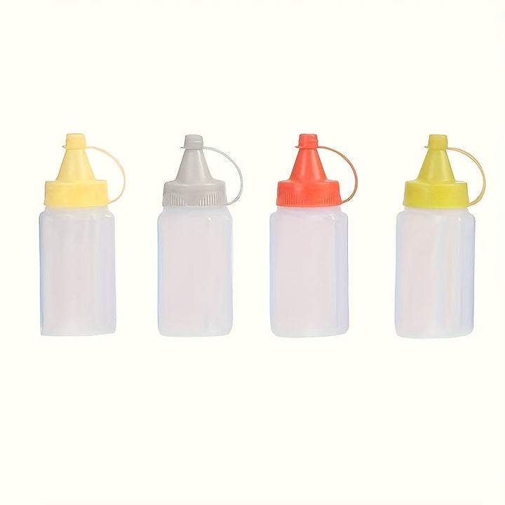 4 botellas mini portátiles para salsas - Duraderas, a prueba de fugas y fáciles de exprimir, ideales para loncheras, picnics y aventuras al aire libre
