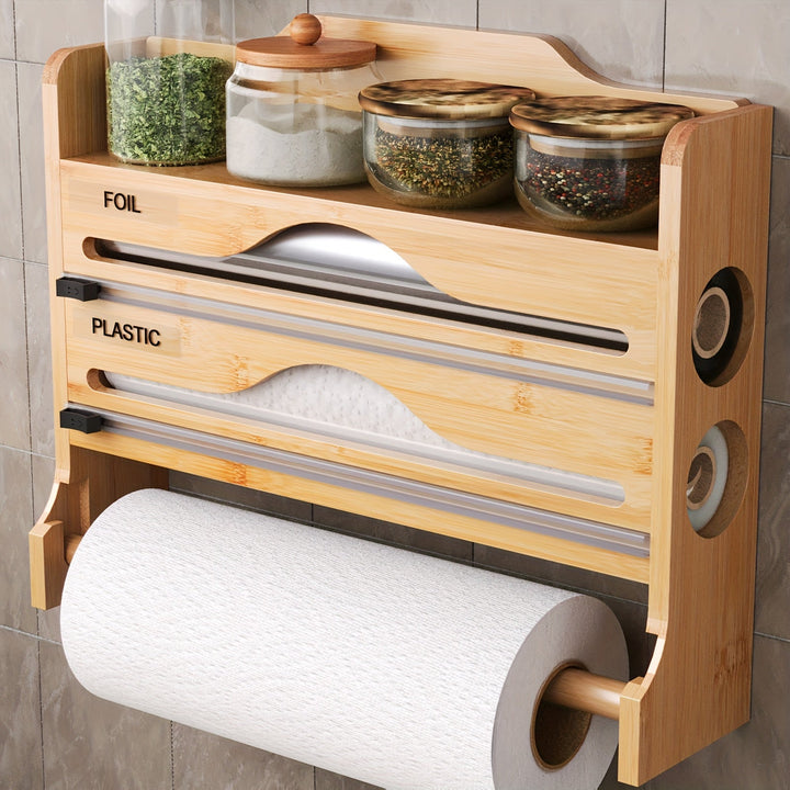 Un cortador de plástico de cocina con soporte para papel toalla, hecho de bambú, sirve como estante de almacenamiento para papel de cocina y papel de aluminio, con dos compartimentos para cortar.